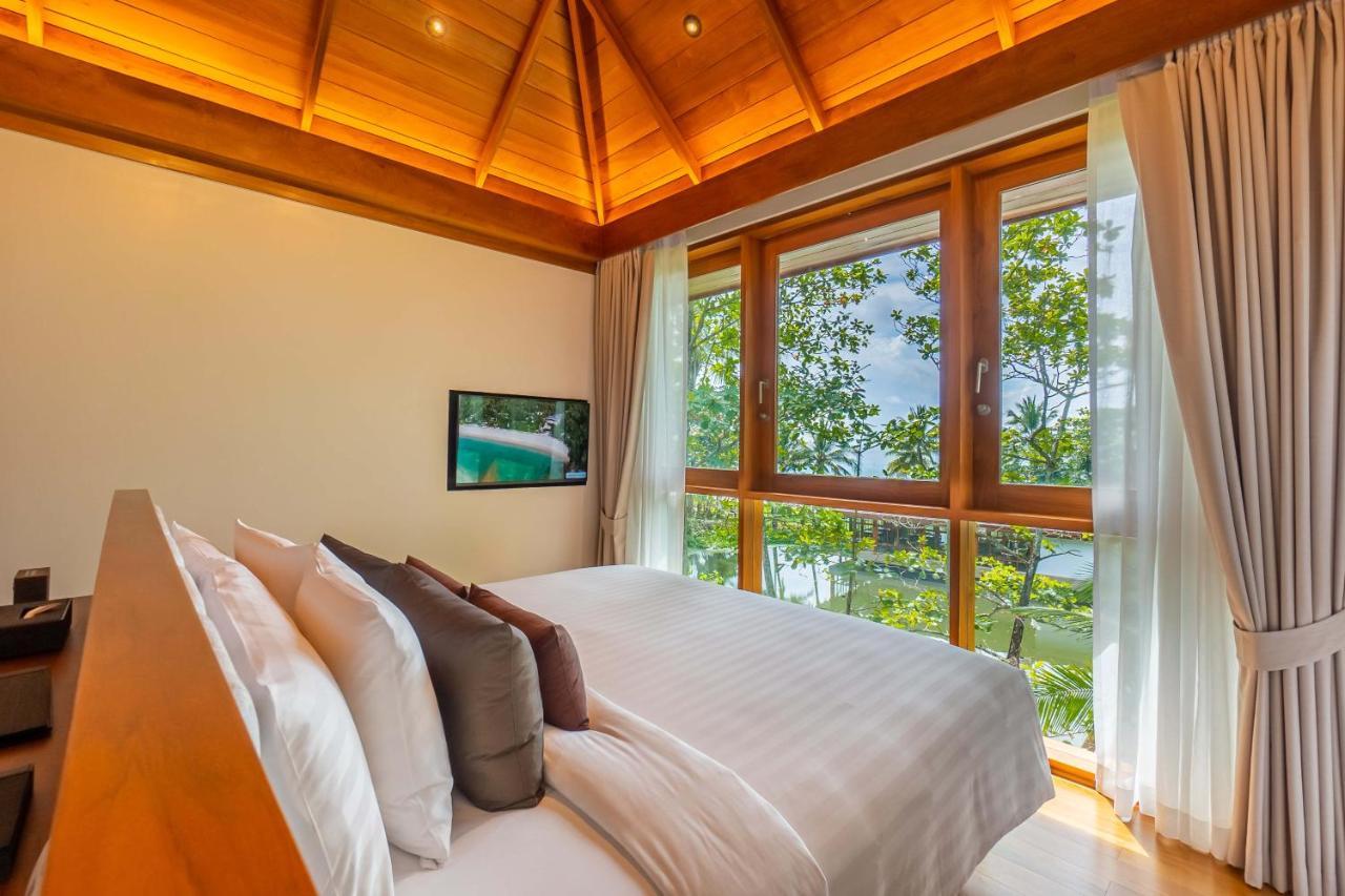 Hotel The Surin Phuket Esterno foto