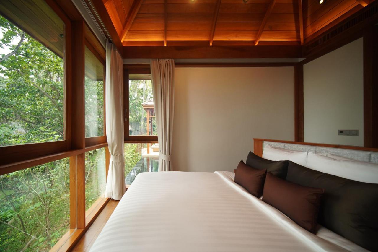 Hotel The Surin Phuket Esterno foto